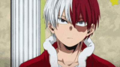 A Close Up Of A Person Wearing A Santa Claus Outfit . GIF