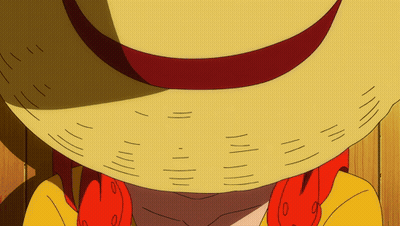 A Close Up Of A Person Wearing A Straw Hat With A Red Ribbon GIF