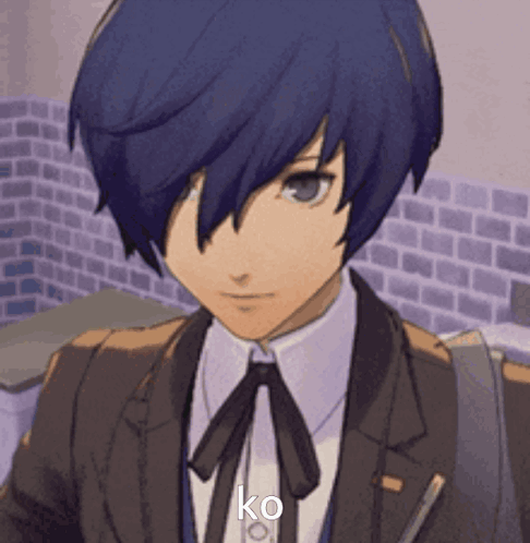 A Close Up Of A Person Wearing A Suit And Tie With The Word Ko On It . GIF