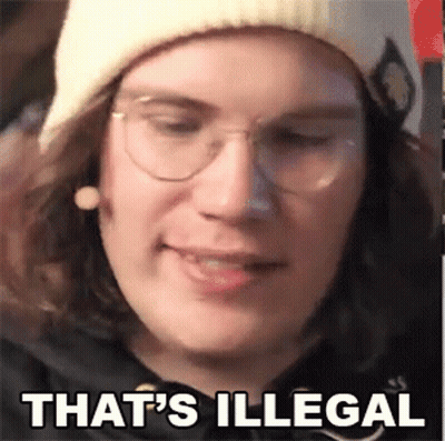 A Close Up Of A Person Wearing Glasses And A Beanie . GIF