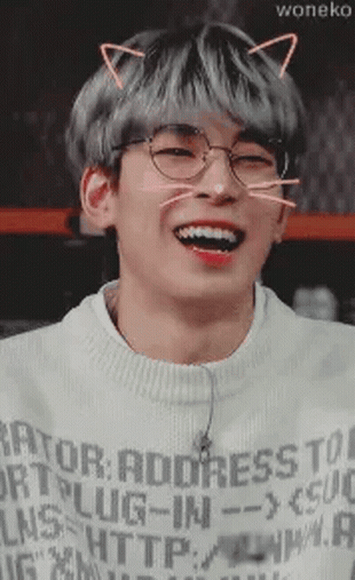 A Close Up Of A Person Wearing Glasses And A Cat Ear . GIF