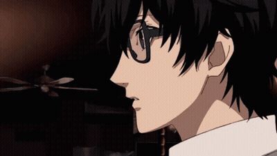 A Close Up Of A Person Wearing Glasses In A Room With A Ceiling Fan . GIF