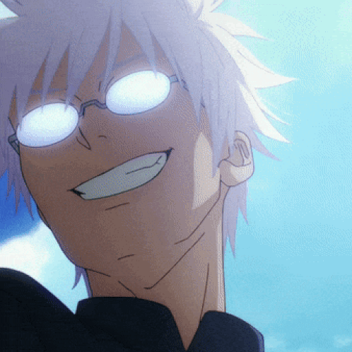 A Close Up Of A Person Wearing Glasses With A Smile On Their Face GIF