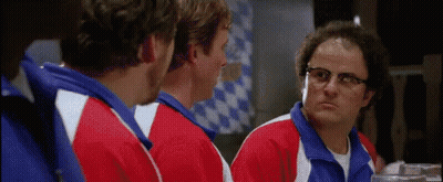 A Close Up Of A Person Wearing Glasses With A Star In His Eye . GIF