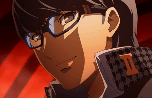 A Close Up Of A Person Wearing Glasses With The Letter I On His Jacket GIF