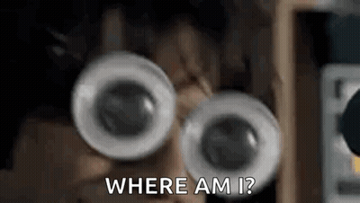 A Close Up Of A Person Wearing Googly Eyes And Saying `` Where Am I ? '' GIF