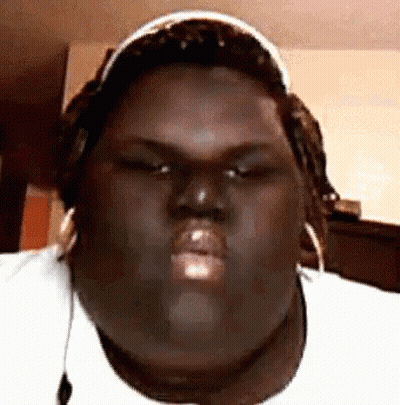 A Close Up Of A Person Wearing Headphones And A Hat . GIF