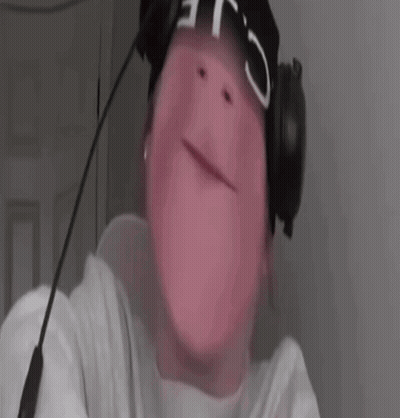 A Close Up Of A Person Wearing Headphones And A Headband . GIF