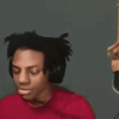 A Close Up Of A Person Wearing Headphones And A Red Shirt GIF