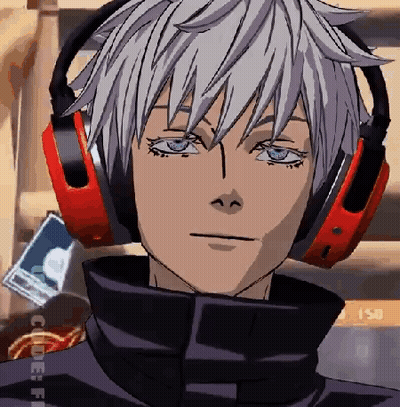 A Close Up Of A Person Wearing Headphones And Looking At The Camera . GIF