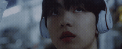A Close Up Of A Person Wearing Headphones With The Letters Sd On The Bottom Right GIF