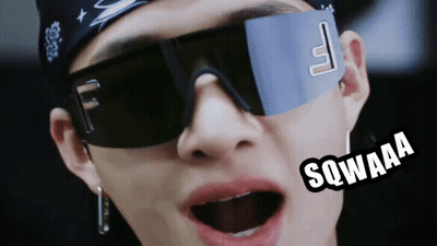 A Close Up Of A Person Wearing Sunglasses And A Bandana That Says Sqwaaa On It GIF