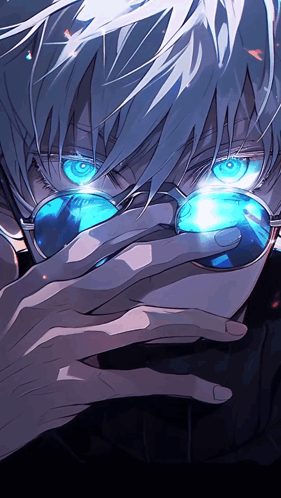 A Close Up Of A Person Wearing Sunglasses And Covering Their Face With Their Hand GIF
