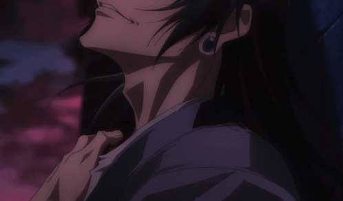 A Close Up Of A Person With Long Black Hair And Earrings GIF