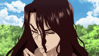 A Close Up Of A Person With Long Hair Covering Their Mouth GIF
