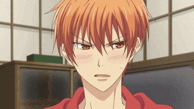 A Close Up Of A Person With Orange Hair GIF