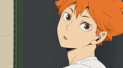 A Close Up Of A Person With Orange Hair And Brown Eyes GIF