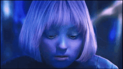 A Close Up Of A Person With Purple Hair GIF