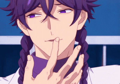 A Close Up Of A Person With Purple Hair Making A Silly Face GIF