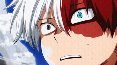 A Close Up Of A Person With Red And White Hair GIF