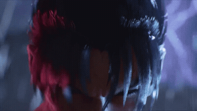A Close Up Of A Person With Red Hair And Black Hair GIF