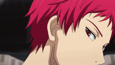 A Close Up Of A Person With Red Hair And Red Eyes GIF