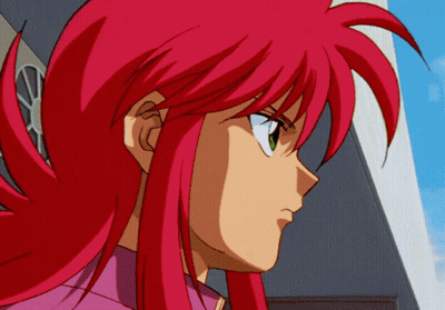 A Close Up Of A Person With Red Hair GIF