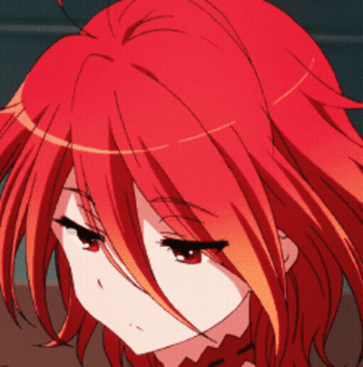 A Close Up Of A Person With Red Hair GIF