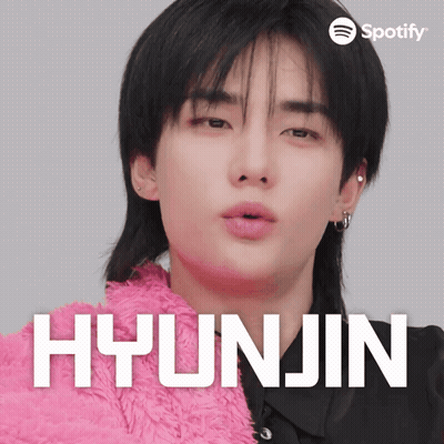 A Close Up Of A Person With The Name Hyunjin On The Bottom GIF
