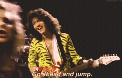 A Close Up Of A Person With The Words Go Ahead And Jump Written On The Bottom GIF