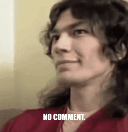 A Close Up Of A Person With The Words " No Comment " Below Them GIF