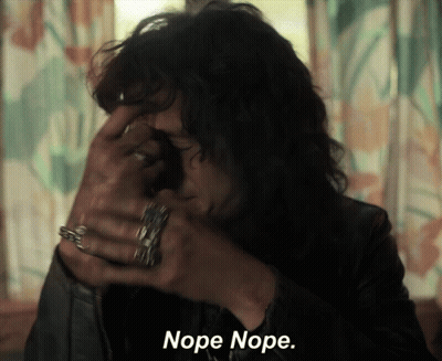 A Close Up Of A Person With The Words Nope Nope GIF
