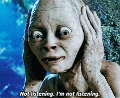 A Close Up Of A Person With The Words " Not Listening I 'M Not Listening " Above Them GIF