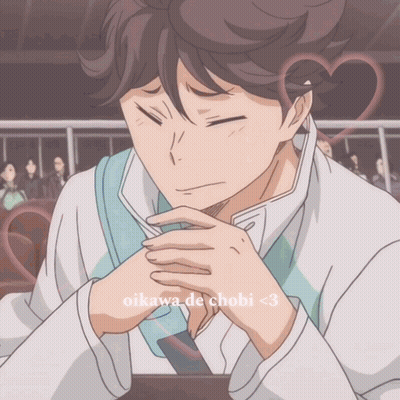 A Close Up Of A Person With The Words Oikawa De Chobi < 3 Below Them GIF