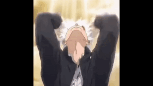 A Close Up Of A Person With Their Arms Outstretched And Looking Up . GIF
