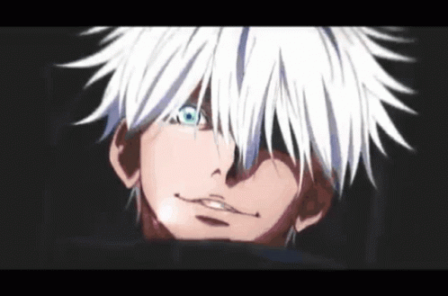 A Close Up Of A Person With White Hair And Blue Eyes . GIF