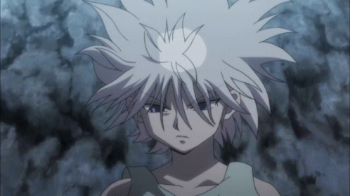 A Close Up Of A Person With White Hair And Blue Eyes GIF