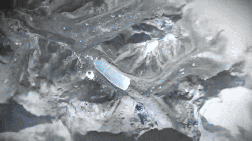 A Close Up Of A Piece Of Ice That Looks Like A Painting GIF