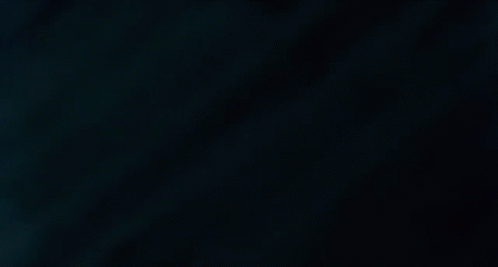 A Close Up Of A Piece Of Metal With A Brown Stripe On The Bottom GIF