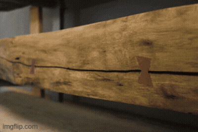 A Close Up Of A Piece Of Wood That Says Imgflip.com On The Bottom Right GIF