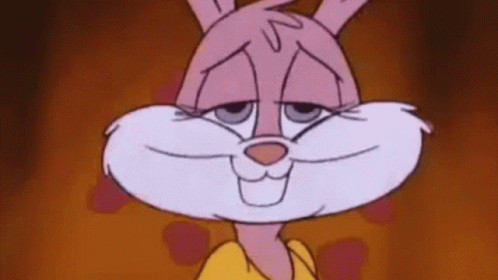 A Close Up Of A Pink And White Cartoon Rabbit Wearing A Yellow Shirt . GIF