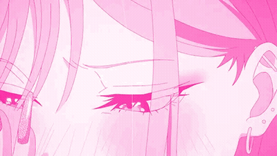 A Close Up Of A Pink Anime Girl 'S Eyes With Long Nails GIF