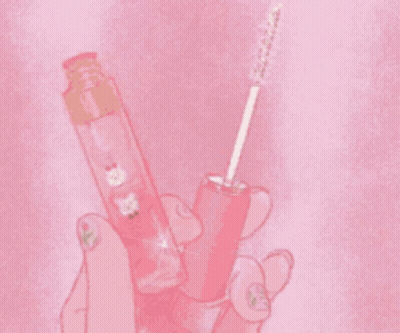 A Close Up Of A Pink Bag With A Stuffed Animal On It . GIF