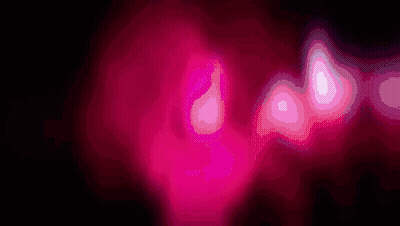 A Close Up Of A Pink Glowing Object With A Black Background GIF