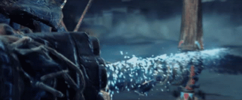 A Close Up Of A Pipe With Water Coming Out Of It In The Dark GIF