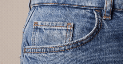A Close Up Of A Pocket Of A Pair Of Blue Jeans GIF