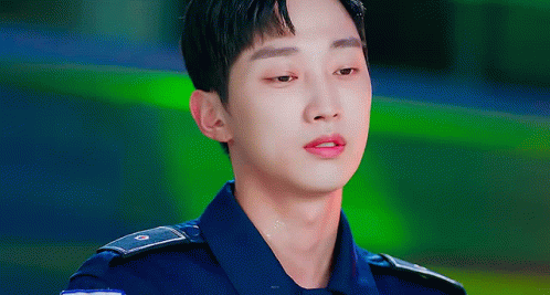 A Close Up Of A Police Officer 'S Face With A Watermark That Says ' A ' On It GIF