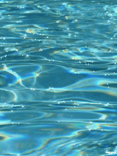 A Close Up Of A Pool Of Water With A Rainbow Colored Reflection GIF