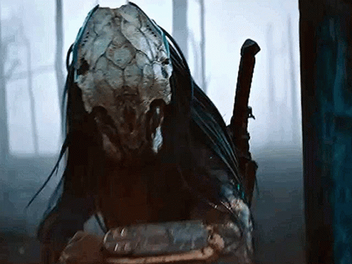 A Close Up Of A Predator With A Sword GIF