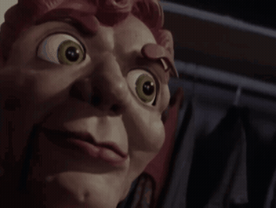 A Close Up Of A Puppet 'S Face With A Big Eye GIF